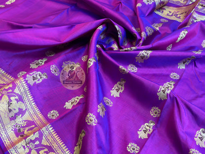 Macro close-up of individual hand-woven motif on Baluchari Silk Saree by Dakshin Vastram, each figure placed deliberately thread by thread on the handloom in Bishnupur Bengal