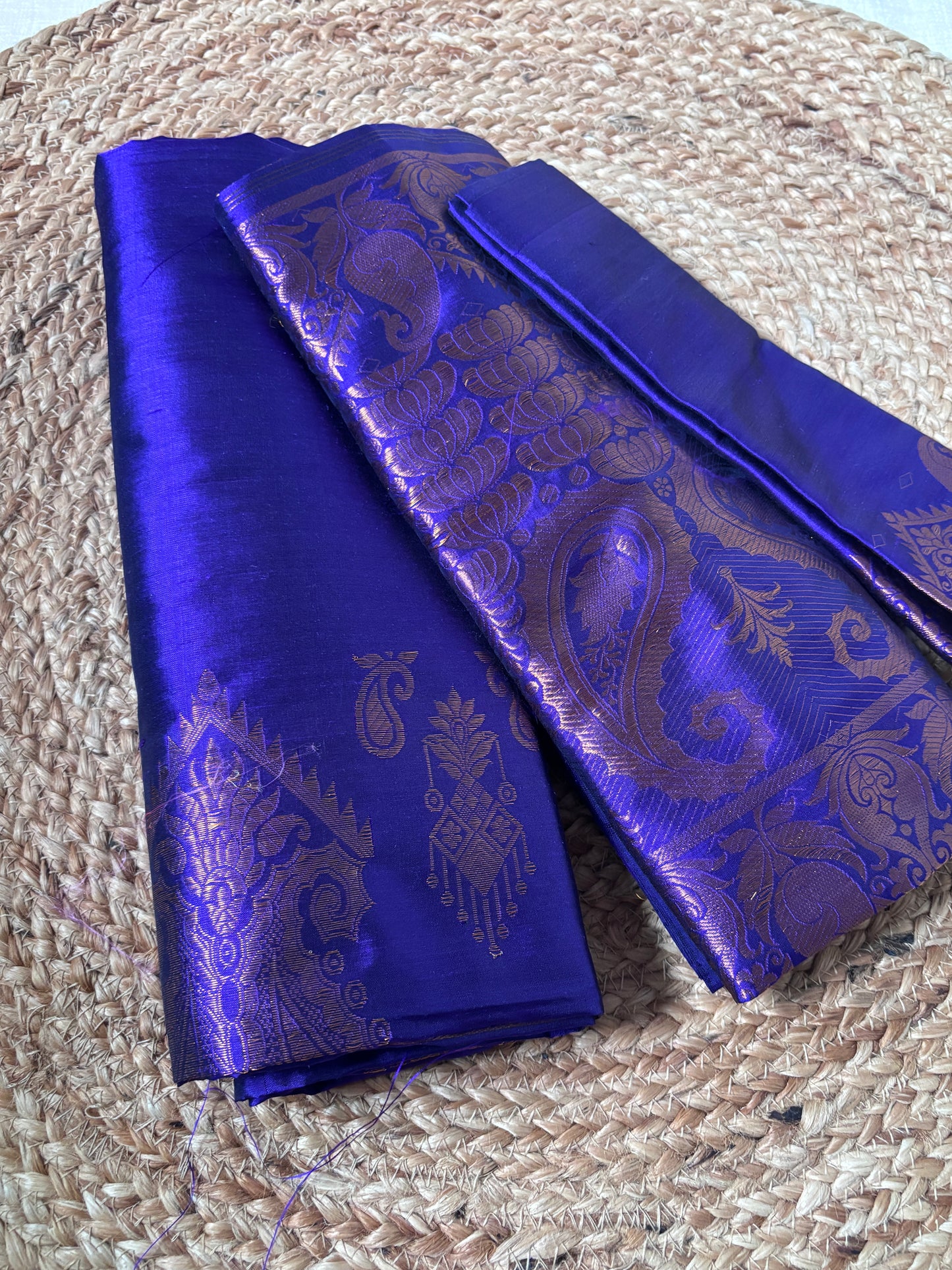 Side view of Paat Mekhela Chador showing first Bihu performance drape and peacock lotus handloom border authentic Sualkuchi Assam silk