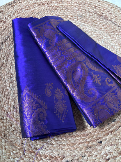 Side view of Paat Mekhela Chador showing first Bihu performance drape and peacock lotus handloom border authentic Sualkuchi Assam silk