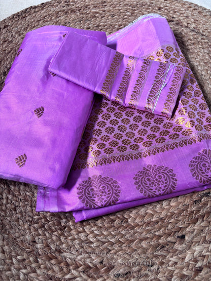 Side view of Paat Mekhela Chador showing bridal reception drape and swan pair handloom border authentic Sualkuchi Assam mulberry silk