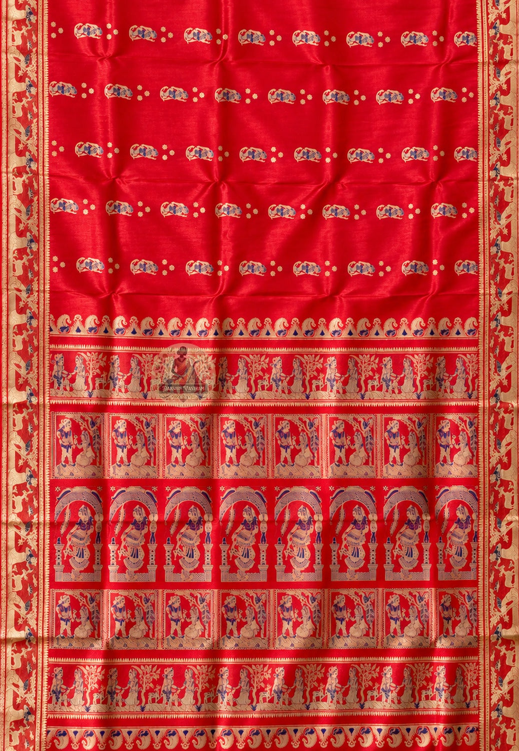 Rear view of Swarnachari silk saree showcasing fully expressed pallu with Ramayana Mahabharata and Bishnupur temple art golden zari motifs visible and readable from across the room