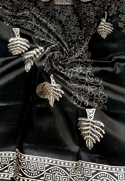 Close-up of handwoven fish scale lattice with zari champa flower buti detail on Bishnupur Katan Silk Saree border