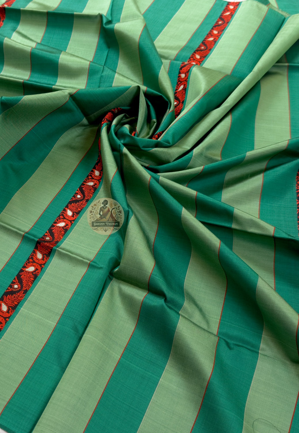 Flat lay of Bishnupur Baluchari pure silk heirloom legacy stole showing full handloom narrative motif composition and geometric floral woven border in silk