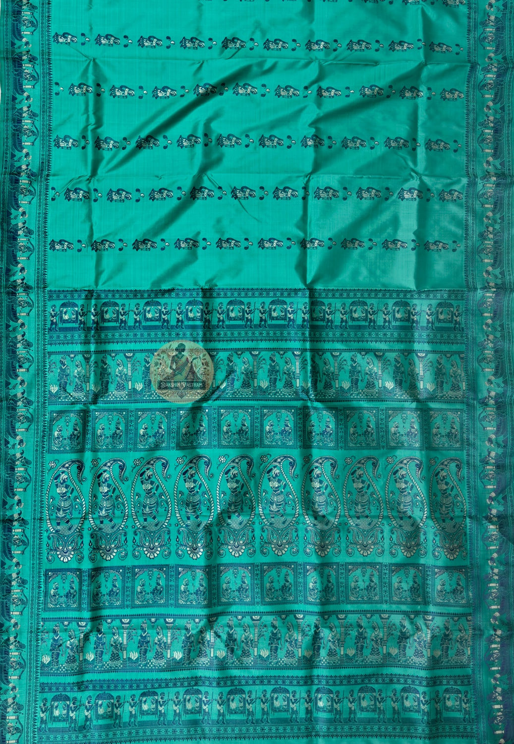 Full saree view of green Baluchari silk saree with decorative borders and an elaborate pallu