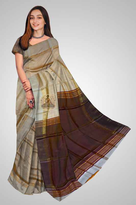 Bishnupuri Pure Katan Silk saree in deep forest green – tightly woven Katan silk with structured drape, full front view