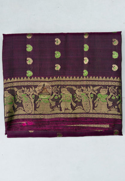 Close-up of hand-woven golden zari motif on Swarnachari silk saree pallu, depicting Mahabharata-inspired courtly scene, West Bengal handloom