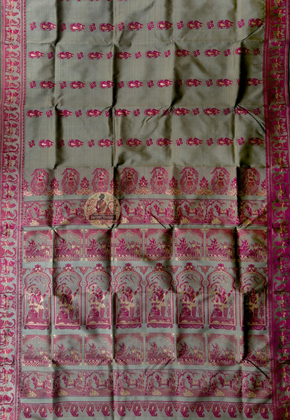 Side view of Baluchari Silk Saree showing fluid silk drape and handloom woven narrative border with butis