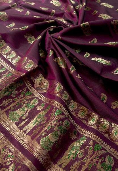 Rear view of Swarnachari silk saree showcasing fully expressed pallu with mythology and Bishnupur temple art golden zari narrative compositions read by those who know Bengali handloom