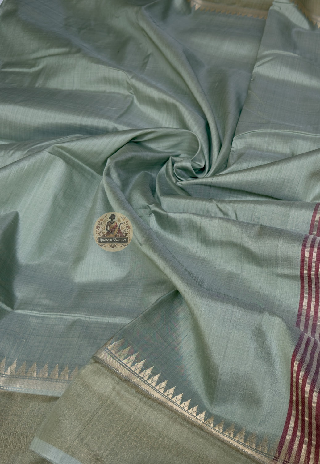 Close-up of handwoven peacock and lotus motifs on Bishnupur Katan Silk Saree pallu, Bengal heritage