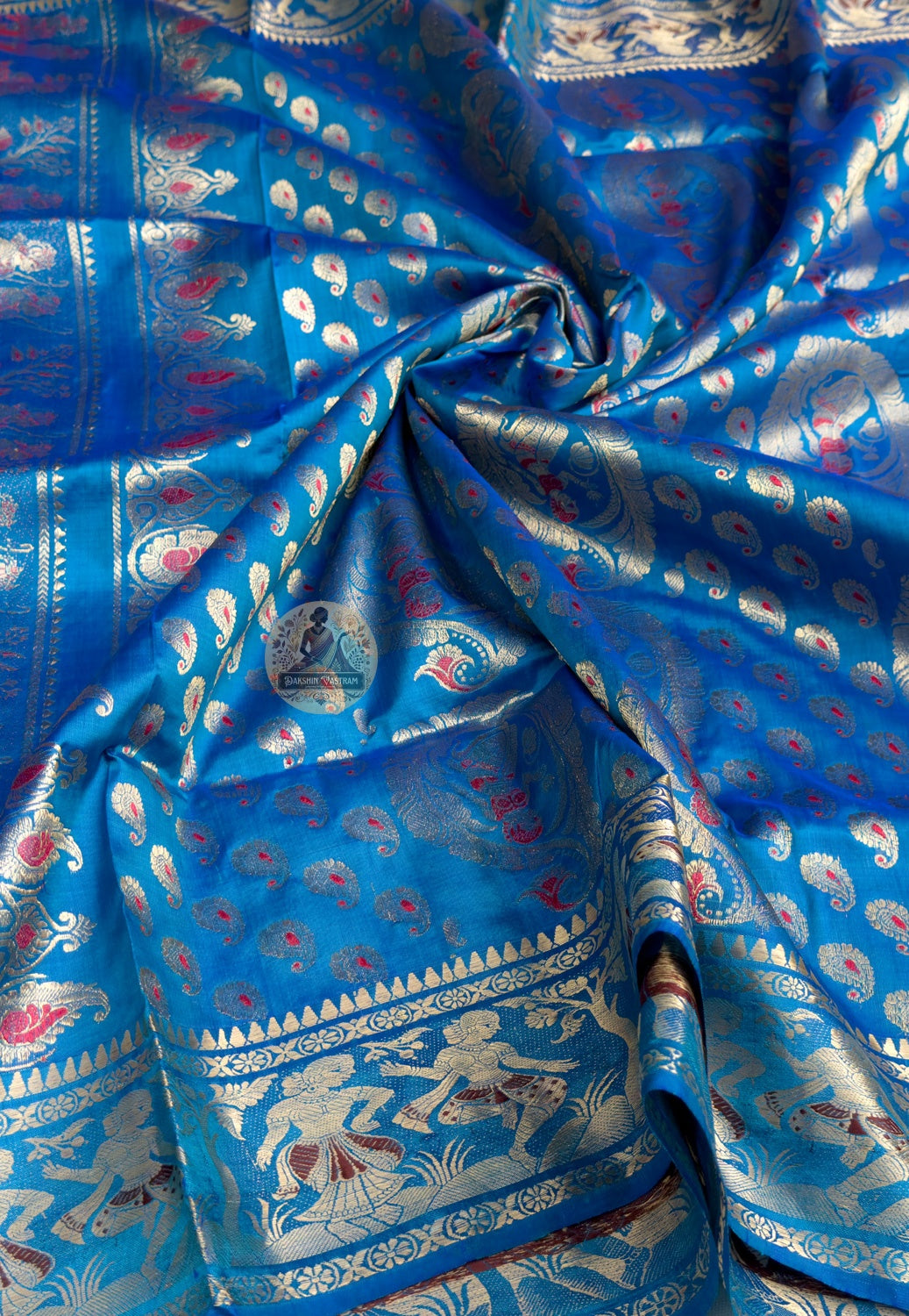 Close-up of handwoven silk weave on Swarnachari saree showing golden zari thread and natural lustre