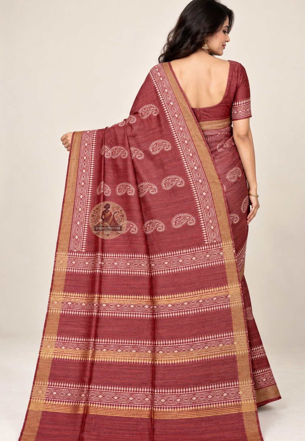 Side view of deep red Ghicha Tussar silk saree showing the drape and diamond-patterned border
