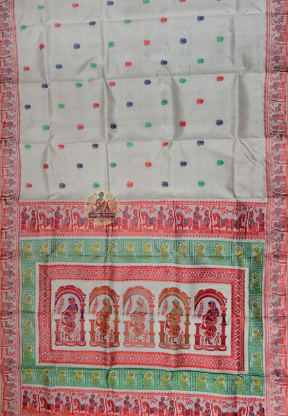 Close up of cream Baluchari silk saree pallu with framed figures and contrasting green bands