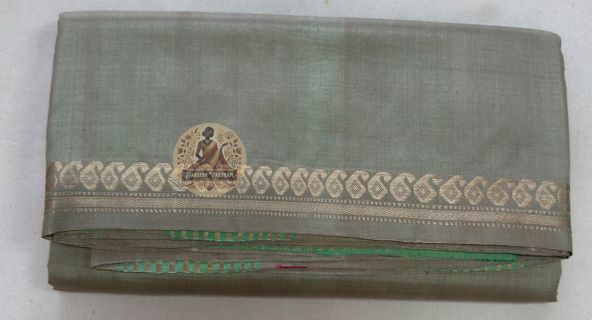 Full flat lay of Bishnupur Pure Katan Silk saree with heritage motifs and included blouse piece