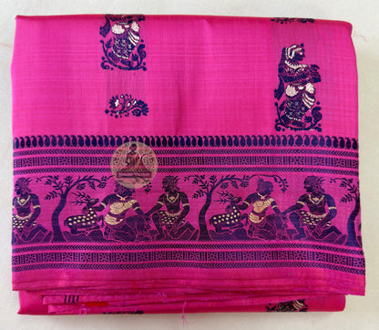 Detail view of the handwoven narrative border frieze on Rani Pink Baluchari Silk Saree, revealing a continuous garden scene of seated figures beneath flowering trees — a poem written in navy thread on rani pink pure silk