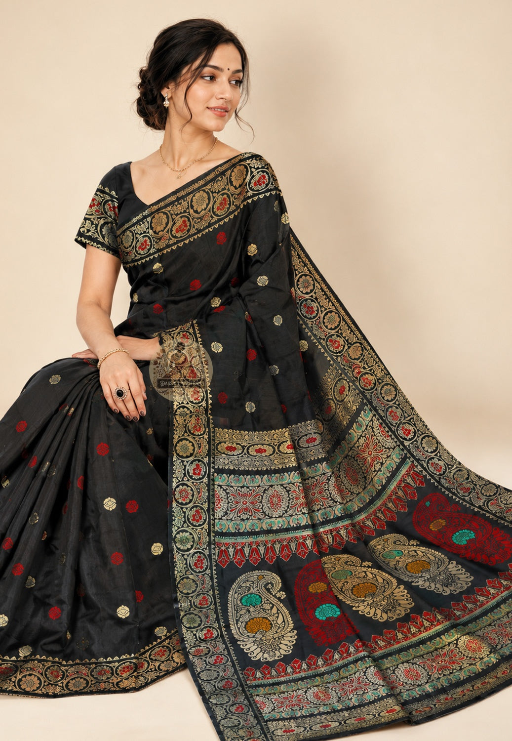 Side view of Baluchari Pure Silk Saree showing the graceful weighted fall and natural sheen of handwoven pure silk with traditional Baluchari buti motifs repeating across the body with quiet confidence