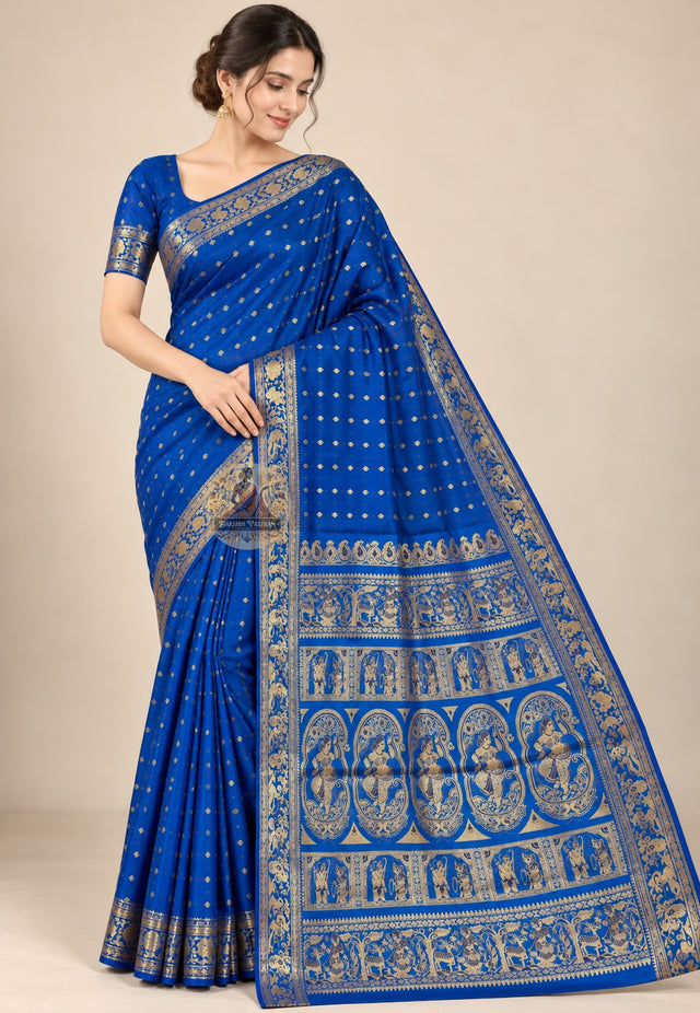 Front view of blue Swarnachari pure silk saree with golden zari mythology motifs handloom woven in West Bengal on deep indigo silk ground for Indian weddings and Diwali