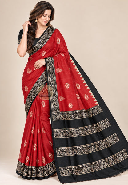 Front view of red Ghicha Tussar silk saree with pale floral motifs and black ornamental borders