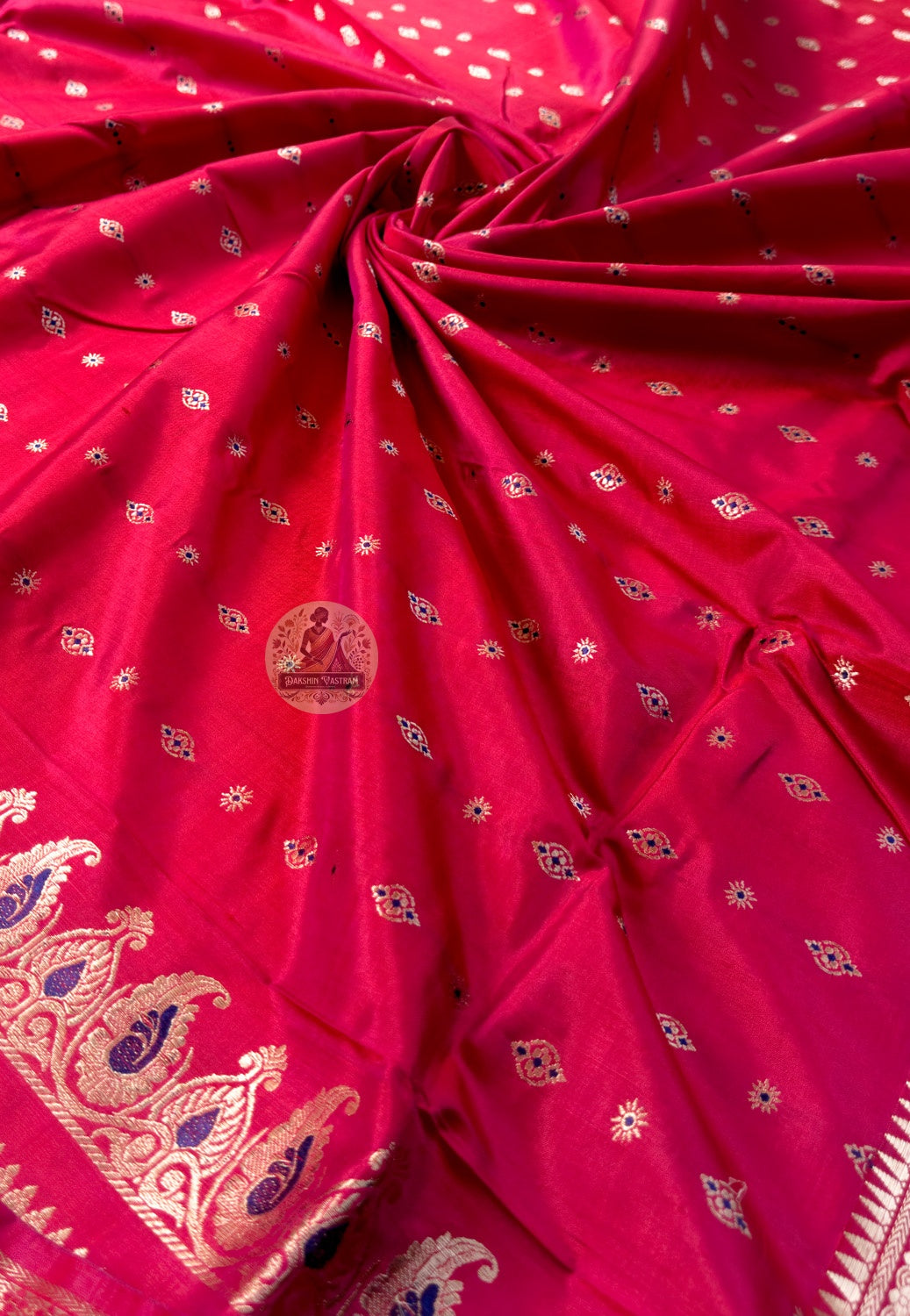 Close-up of pallu of Swarnachari pure silk saree showing golden zari mythology and Bishnupur temple art narrative that reveals full detail at closer inspection in West Bengal handloom