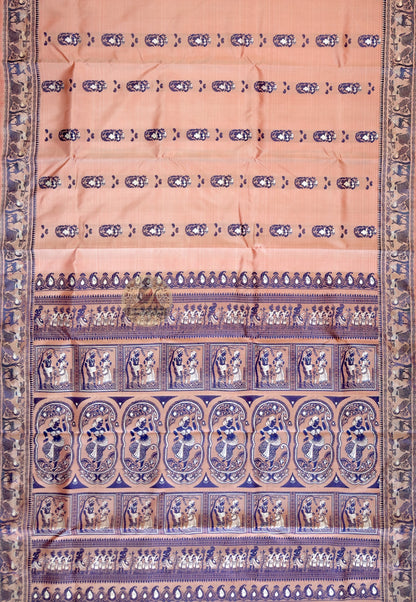 Close-up of Baluchari silk pallu featuring hand-woven mythological figures, temple motifs and celestial patterns in copper peach pure silk