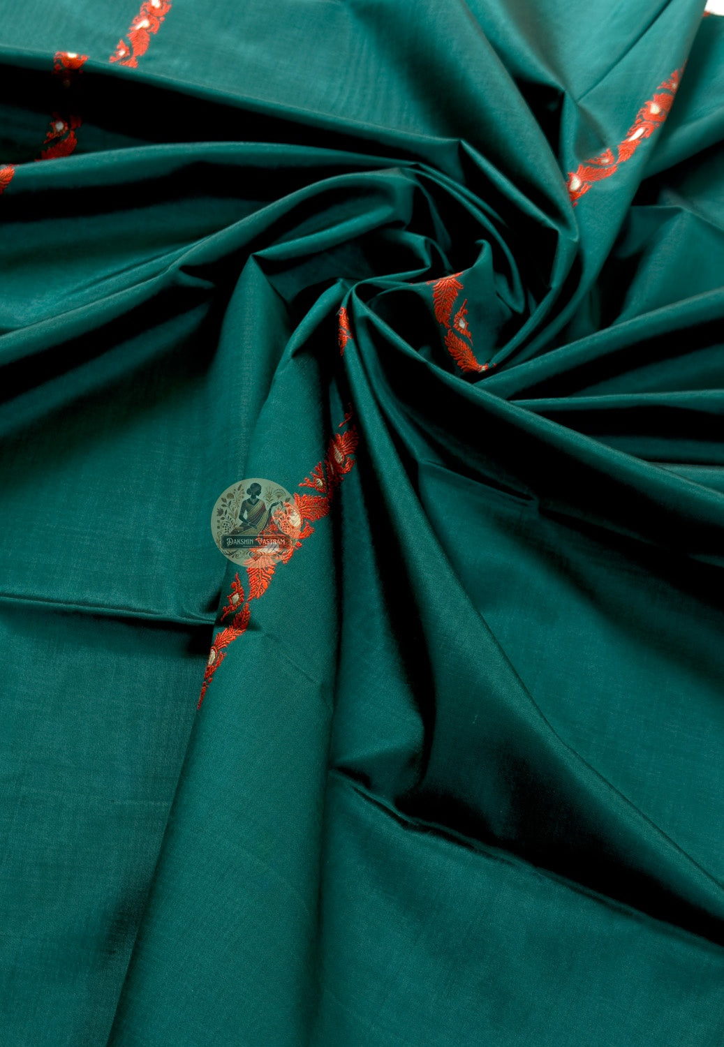 Flat lay of Bishnupur Baluchari pure silk stole displaying full handloom storytelling motifs and woven floral border in West Bengal silk