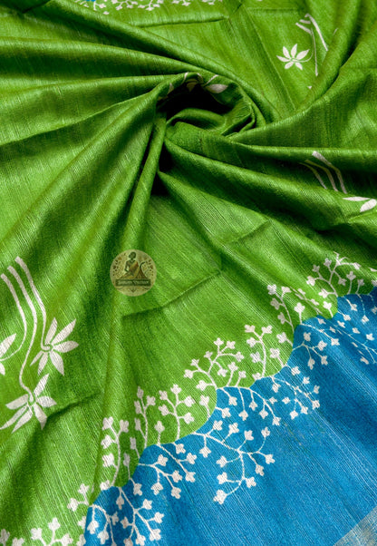 Full saree view of green Ghicha Tussar silk saree with blue borders and a striped floral pallu