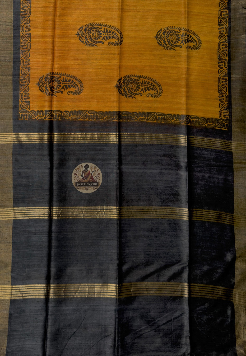 Close-up of Ghicha Tussar silk saree weave showing natural slub texture and inherent variation of short-staple Tussar silk yarns woven on traditional handloom