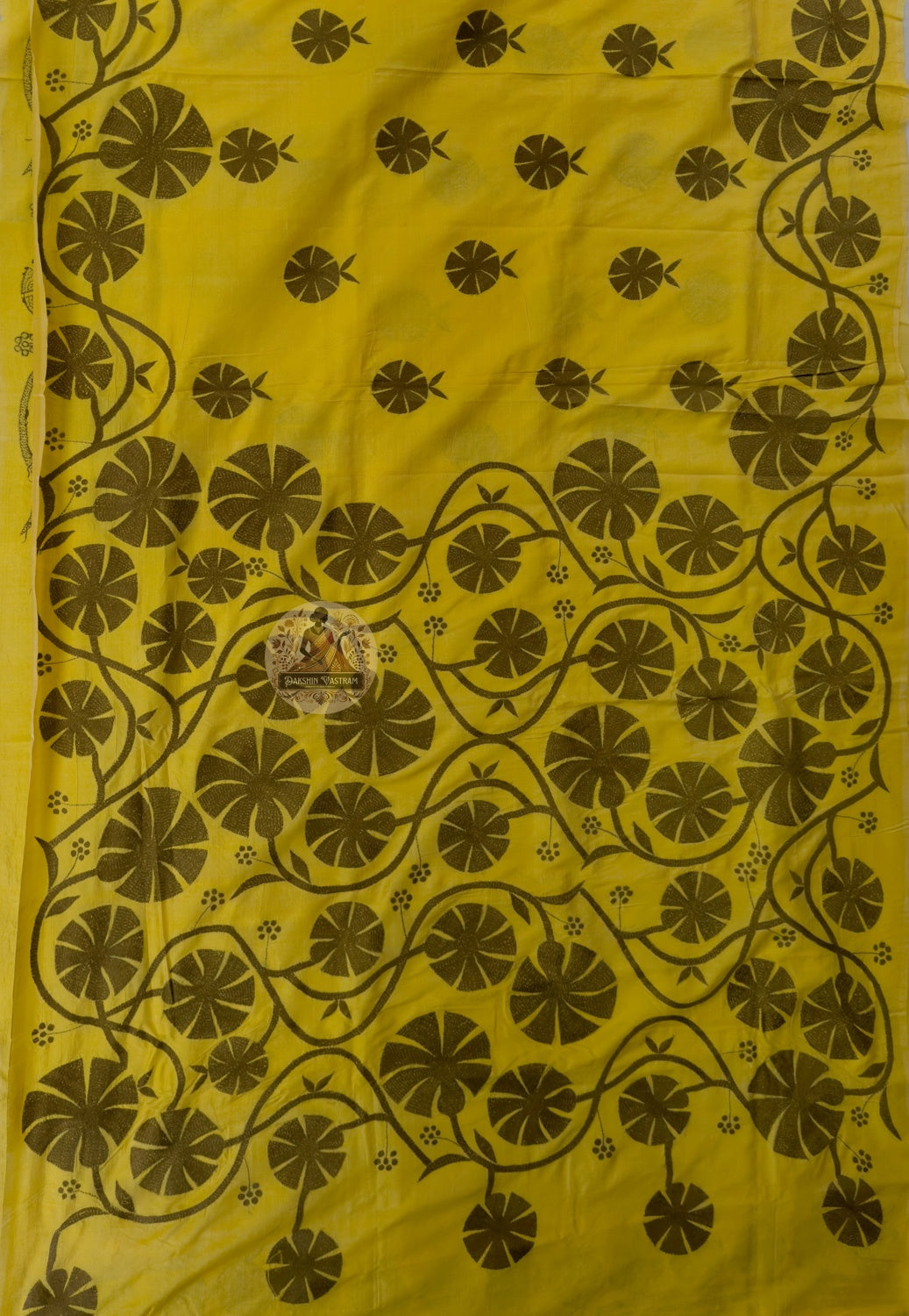Close-up of Bishnupur handloom silk saree weave revealing intricate Bengal temple and terracotta-inspired motifs