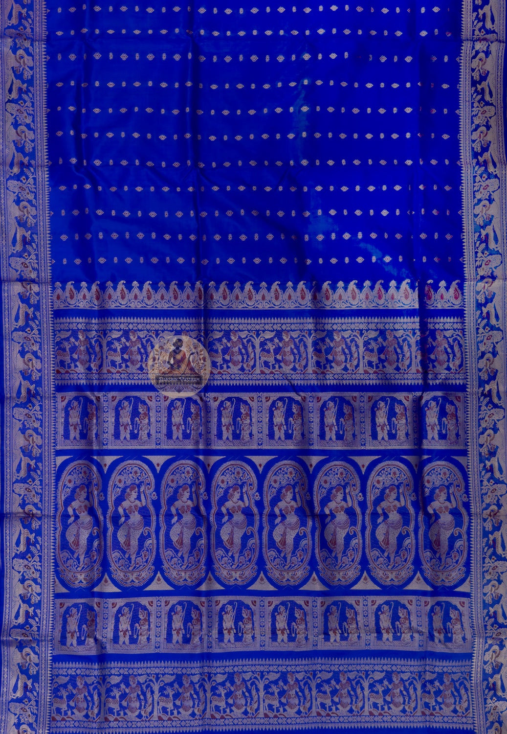 Close-up of hand-woven golden zari motifs on Swarnachari silk saree pallu, temple art and mythology inspired