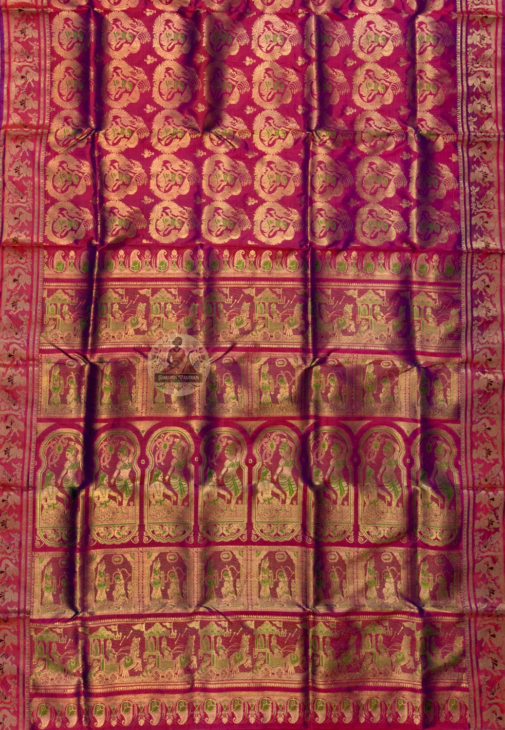 Side view of Swarnachari handloom silk saree showing golden zari cartography border and warm pure silk drape of a tradition that knows its territory precisely, West Bengal weave