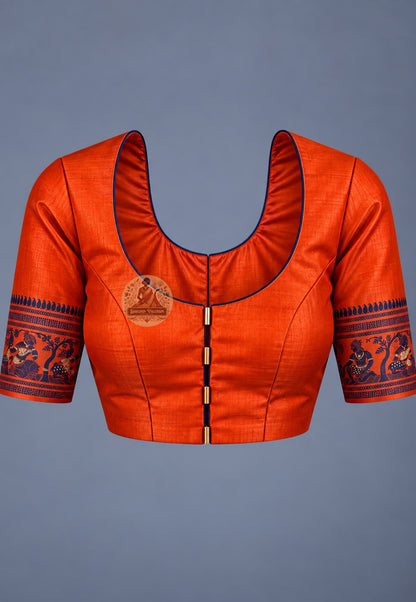 Blouse paired with orange Baluchari silk saree, featuring patterned sleeve borders