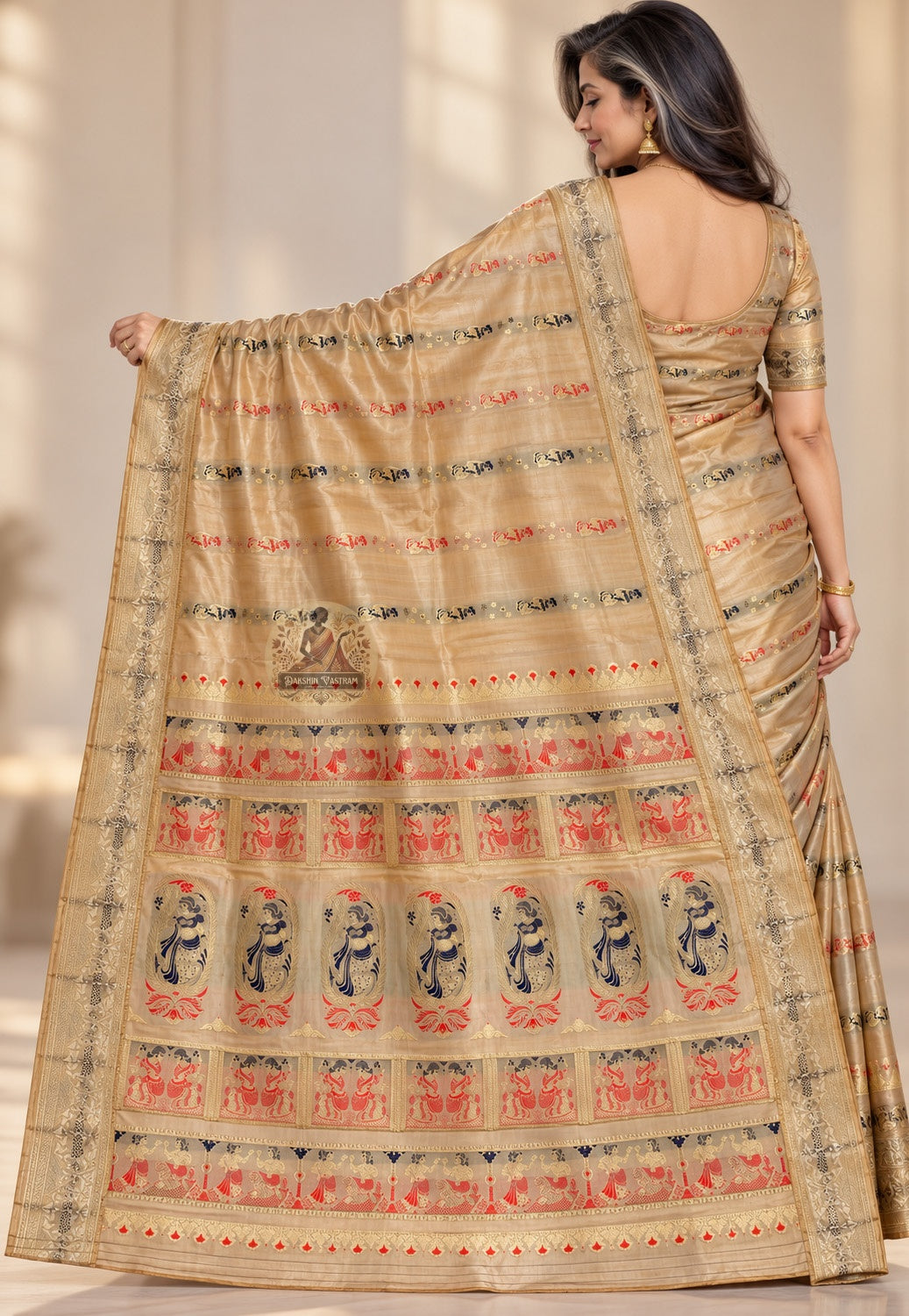 Side view of champagne gold Swarnachari silk saree showing the drape and fine patterned border