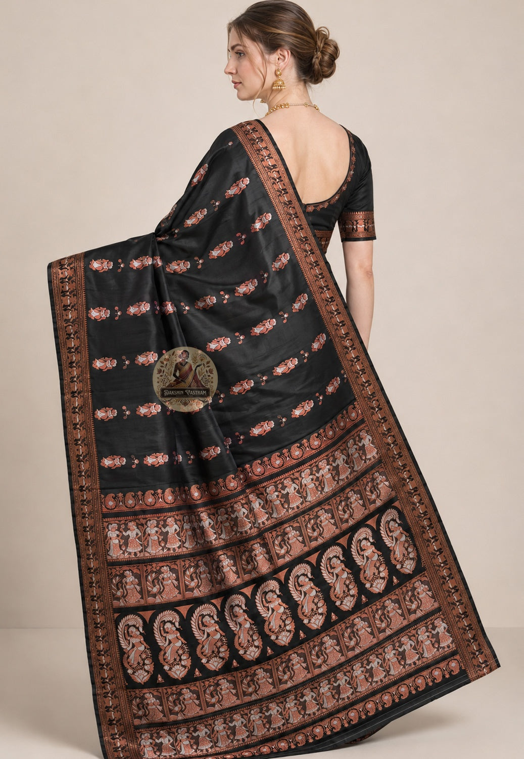 Front view of woman wearing Swarnachari silk saree in traditional drape, golden zari pallu cascading over shoulder