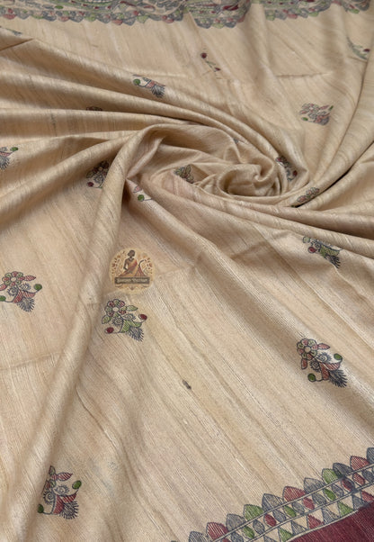 Close up of small dark-toned motifs across the beige Ghicha Tussar silk saree body