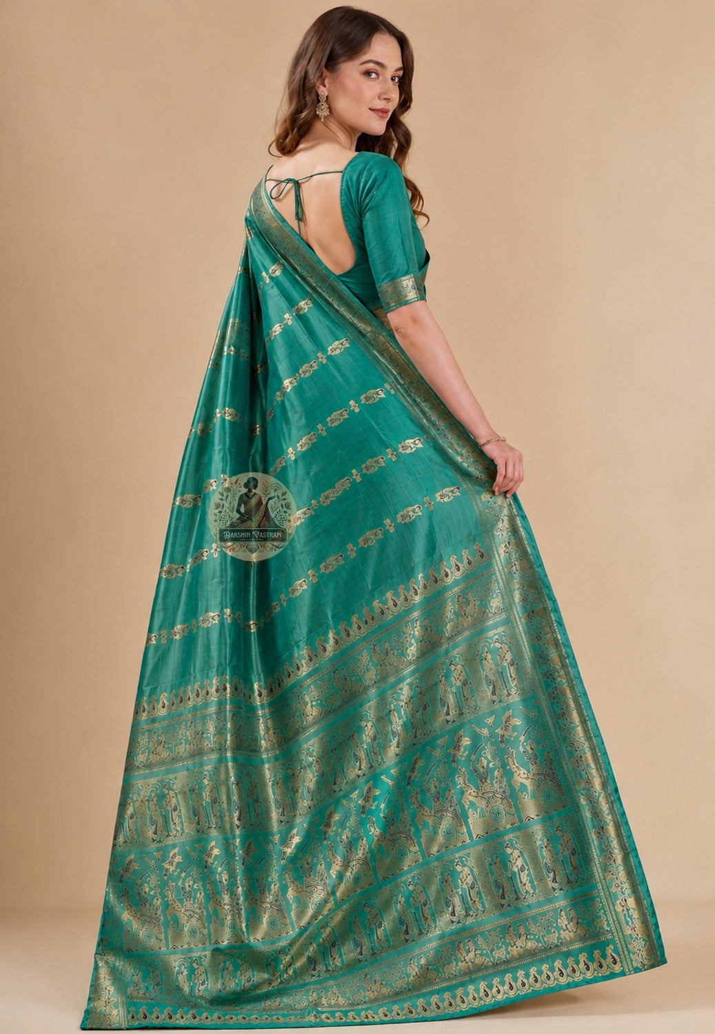 Side view of teal green Swarnachari Pure Katan Silk Saree showing Saptami morning drape and golden zari Shakuntala letter border Bishnupur