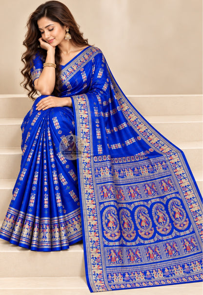 Rear view of royal blue Baluchari silk saree with the figurative pallu draped over the shoulder