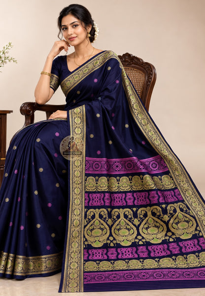 Front view of woman wearing Baluchari Silk Saree with antique gold jewellery, bridal reception heirloom occasion