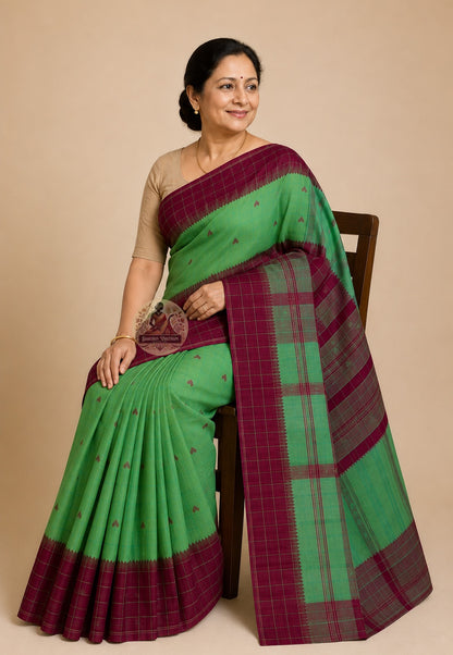 Rear view of pure cotton handloom saree highlighting the pallu and woven border, crafted as a heirloom gifting saree for Indian occasions