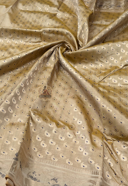 Rear view of premium Swarnachari silk saree displaying wide golden zari pallu with high-resolution mythological court and temple composition panels