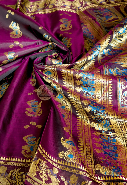 Rear view of coffee Baluchari silk saree showcasing fully expressed pallu with Ramayana Mahabharata and Shakuntala narrative compositions individually woven in silk thread on coffee ground