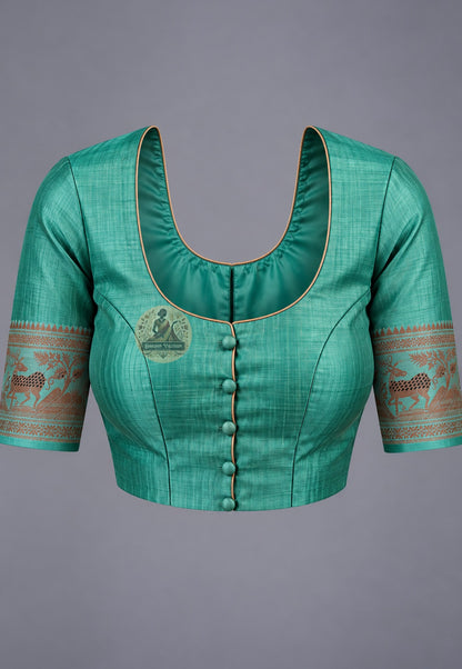 Blouse paired with green Swarnachari silk saree, featuring a contrasting patterned sleeve border
