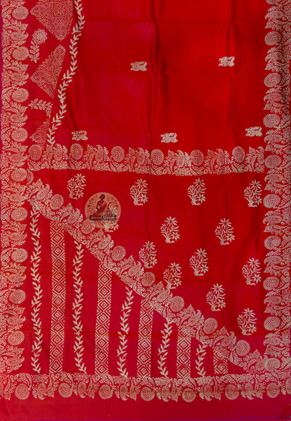 Close-up of Bishnupur pure Katan silk saree showing how handloom silk absorbs and warms light, Bengal artisan weave