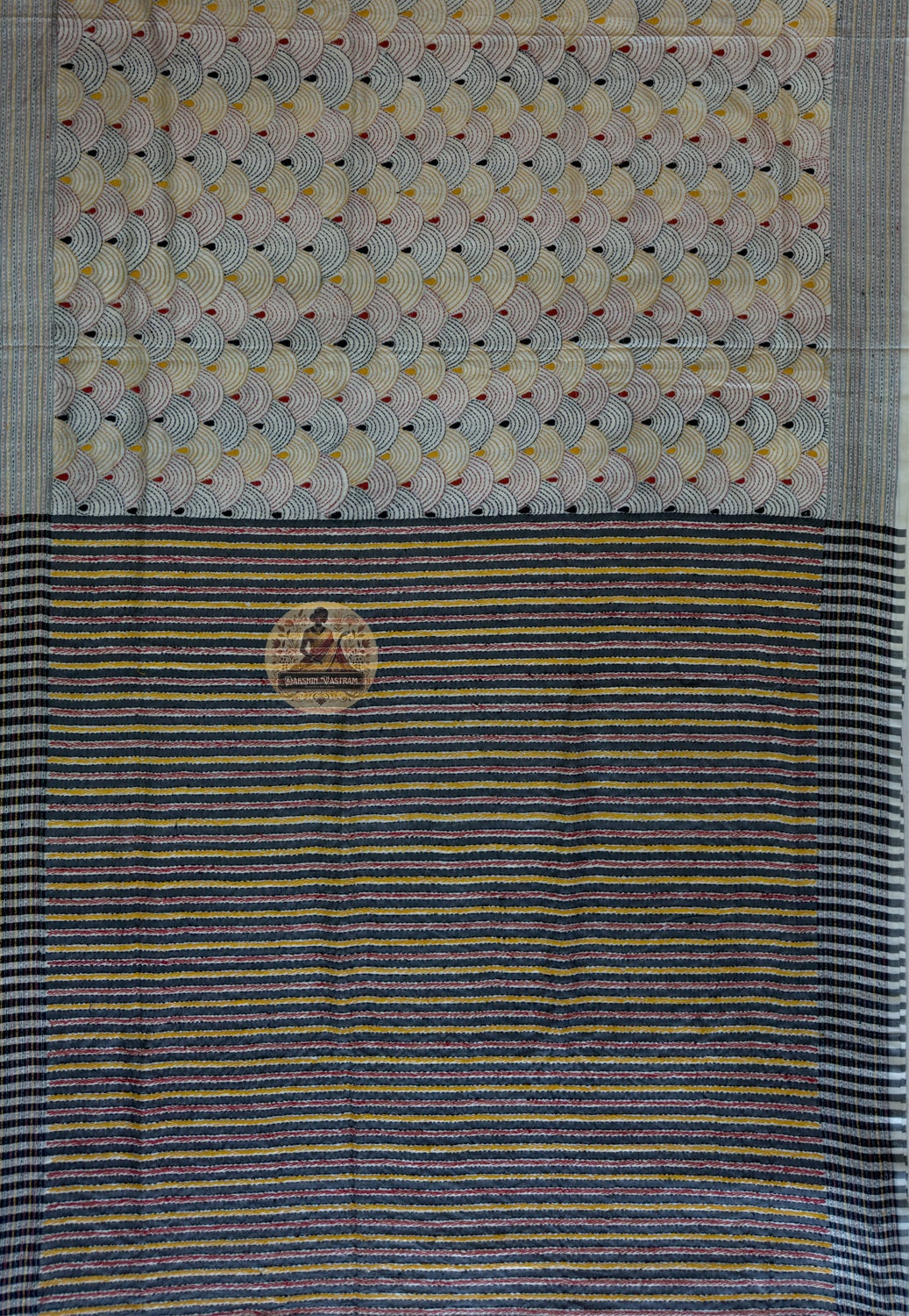 Close-up of handwoven Bishnupur silk weave showing natural lustre beneath Kantha stitch embroidery