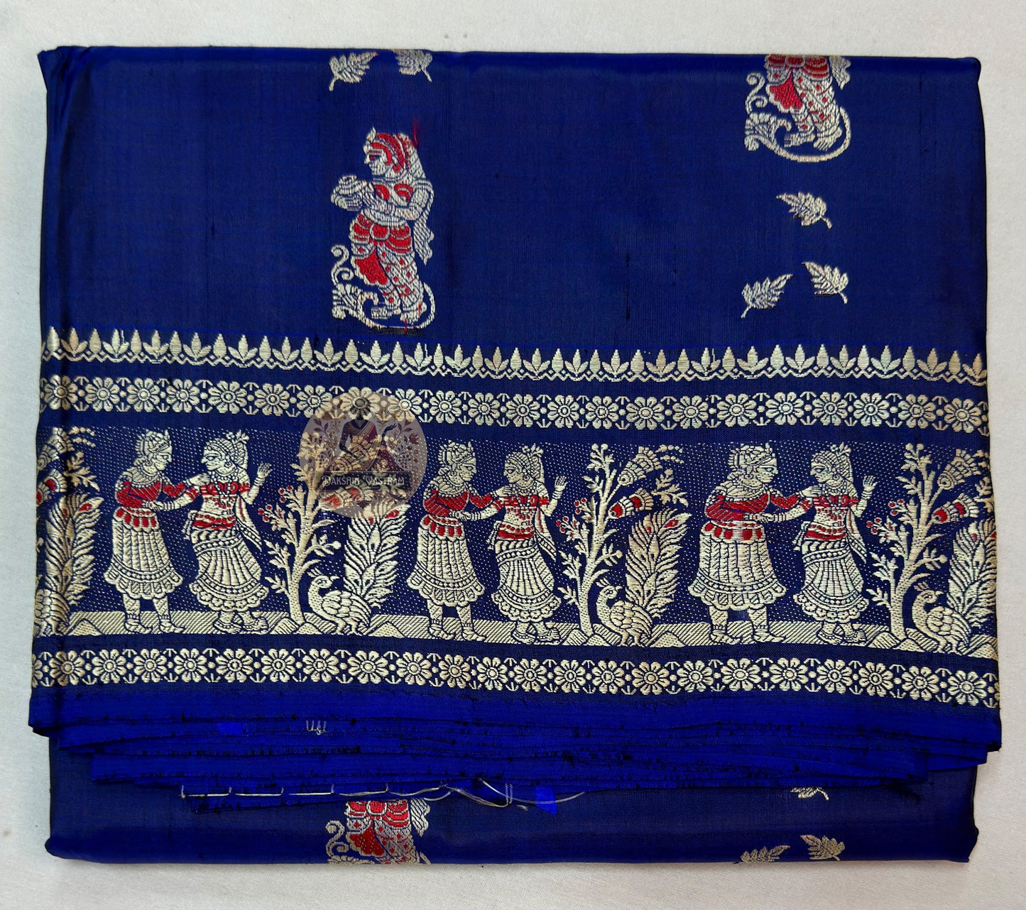 Detail view of traditional Baluchari buti motifs handwoven across the body of Baluchari Pure Silk Saree, revealing the fine weave precision and natural silk lustre of a Bengal textile tradition that survived near-extinction and endures