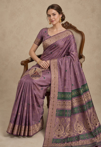 Side view of Swarnachari handloom silk saree showing golden zari declaration border and warm pure silk drape of a tradition that has never doubted its own worth, West Bengal weave