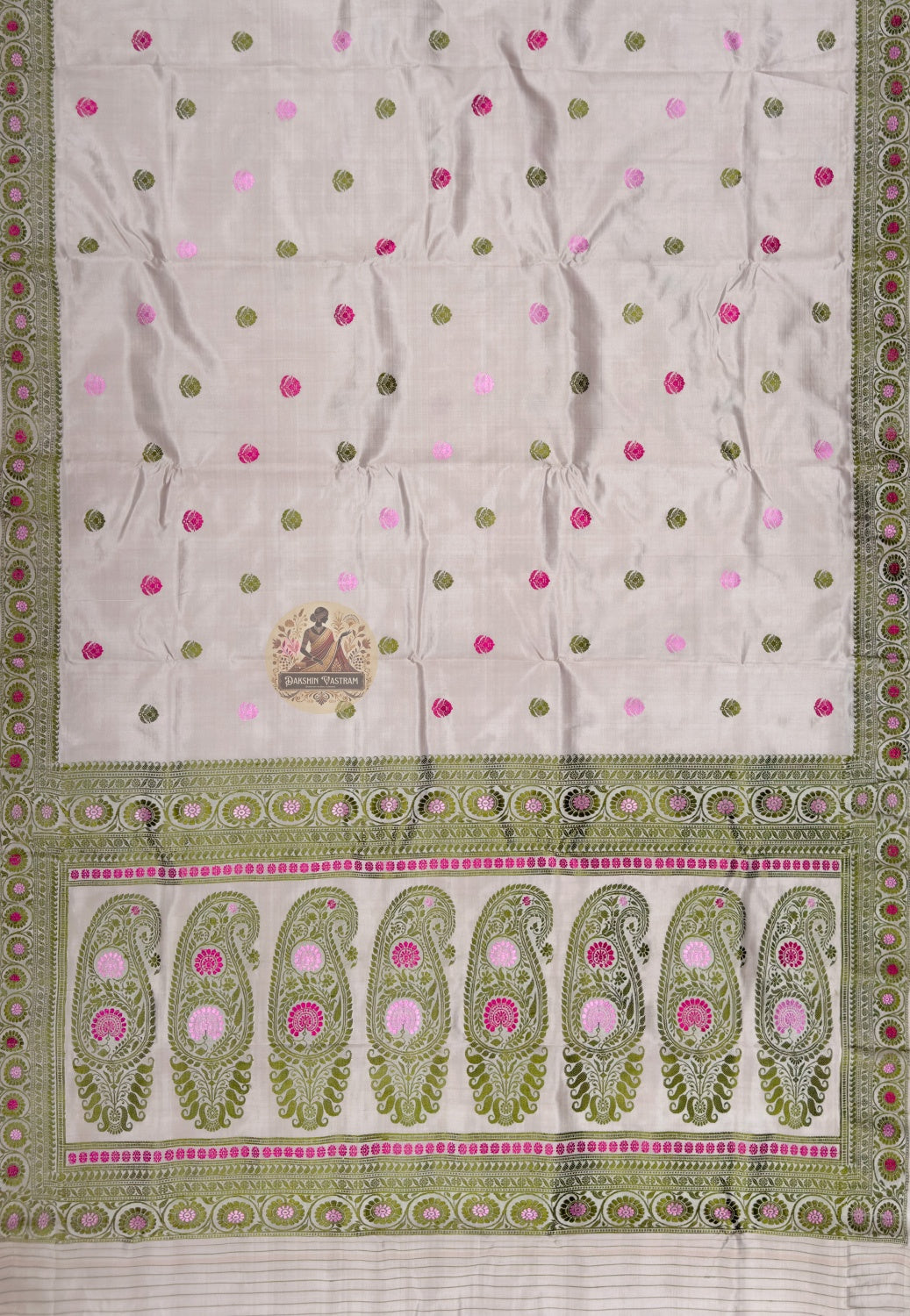 Full saree view of taupe Baluchari silk saree with scattered circular motifs and a decorative paisley pallu