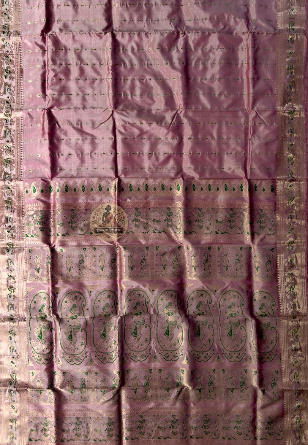 Close-up of Swarnachari silk saree weave showing golden zari Ramayana figures Malla court motifs and Bishnupur temple art patterns formed one thread at a time on pure silk ground
