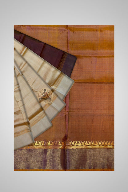 Structured woven border of Bishnupuri Katan saree showing repeating traditional motif strip and refined selvedge finish
