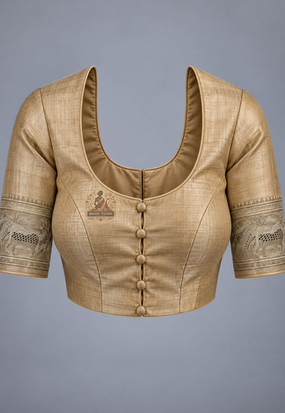 Blouse paired with champagne gold Swarnachari silk saree in a coordinating warm shade