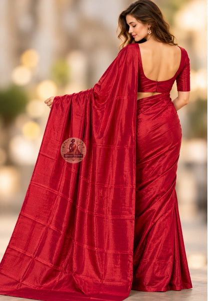 Rear view of red Bishnupur silk saree with the plain red pallu draped over the shoulder