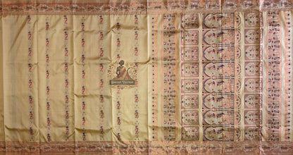 Side view of Bishnupur Swarnachari handloom silk saree displaying elegant drape and golden zari glow on cream pure silk